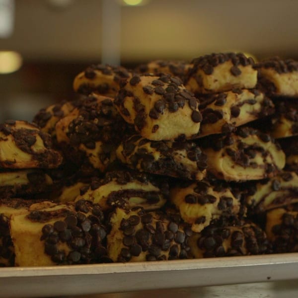 A close-up of a pile of chocolate chip rugelach pastries from Canter's Deli.