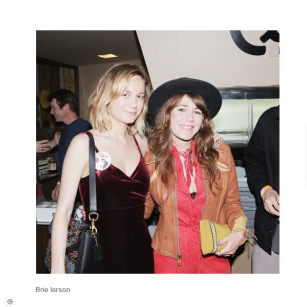 Brie Larson and another woman smiling, posing together at Canter's Deli.